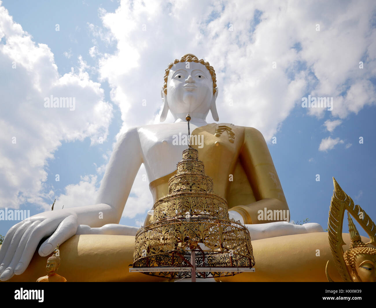 Low angle of giant Buddha statue at Wat Phra That Doi Kham (Temple of ...