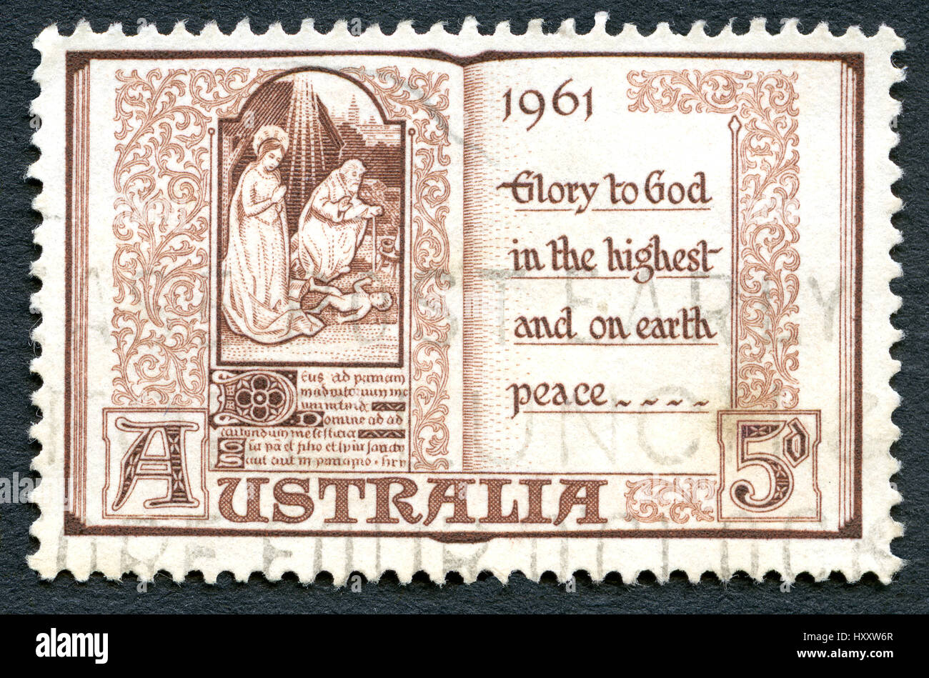 AUSTRALIA - CIRCA 1961: A used postage stamp from Australia, depitcing a festive illustration and message to commemorate Christmas, circa 1961. Stock Photo