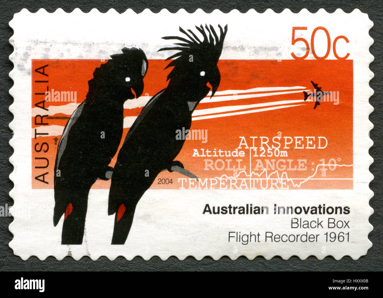 AUSTRALIA - CIRCA 2004: A used postage stamp from Australia, celebrating Australian Innovations - this one commemorating the Black Box Flight Recorder Stock Photo