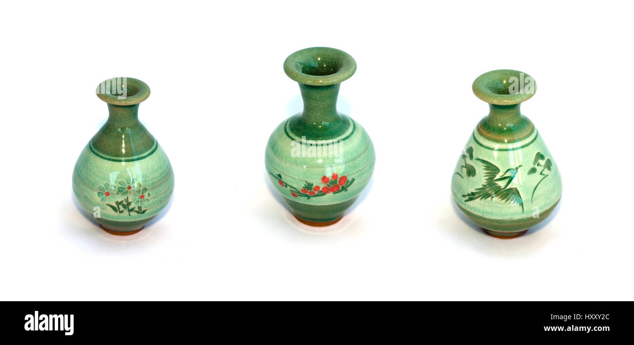 Collage of green ceramic vases isolated on white background Stock Photo