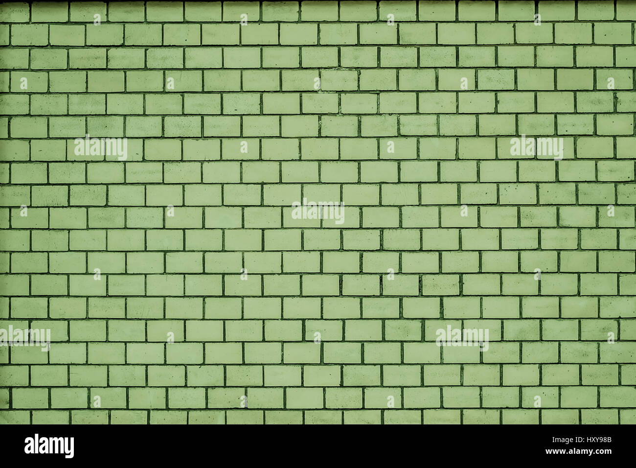 An old pale green brick wall texture for background Stock Photo - Alamy