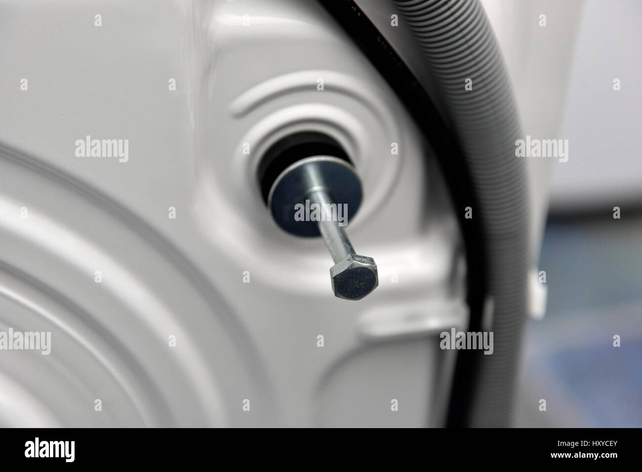 Transit bolts at the back of a domestic washing machine Stock Photo - Alamy