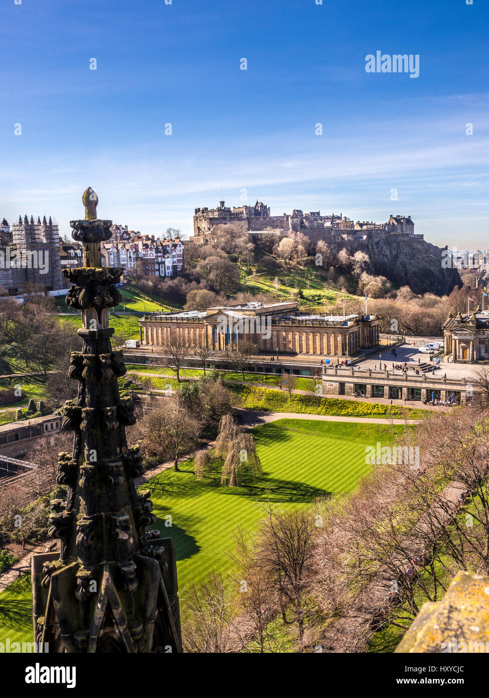 East Princes Street Gardens and Scottish National Gallery, with blacken stone work on the Scott Monument in the foreground. Edinburgh, Scotland, UK. Stock Photo