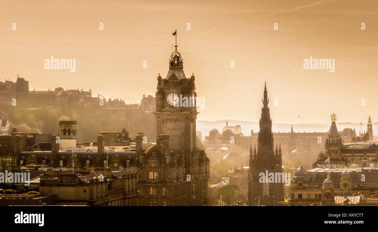 Atmospheric aerial view of Edinburgh with a golden sky and hazy sunlight. Stock Photo