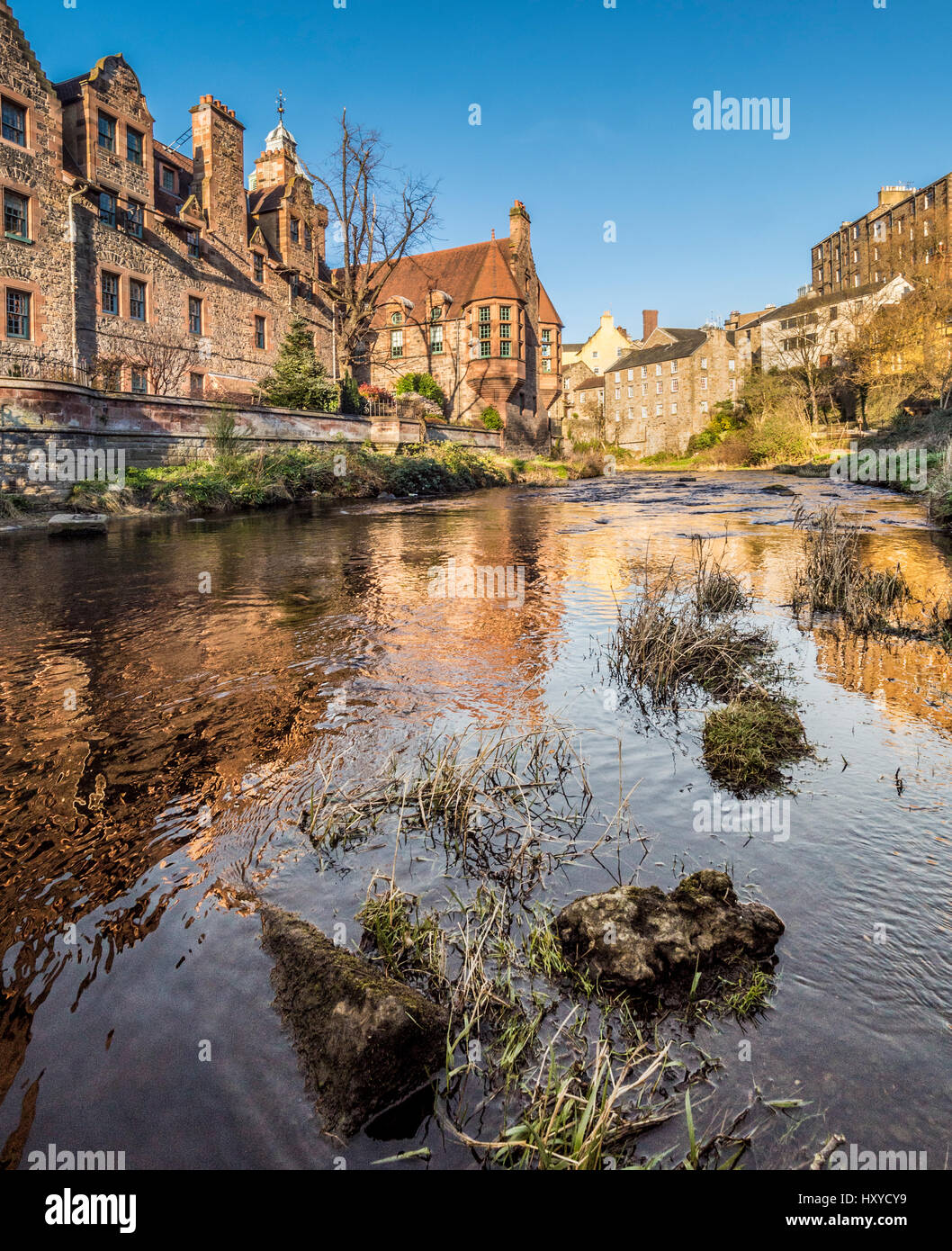 Water of Leith with Well Court in  Dean Village in the distance. Edinburgh, Scotland. Stock Photo