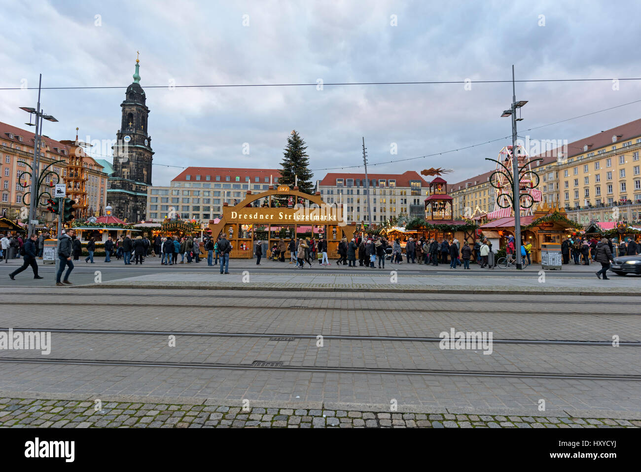 Dresden, Germany - November 27, 2015: People enjoy Christmas market in Dresden. It is Germany's oldest Christmas Market - Striezelmarkt. Stock Photo