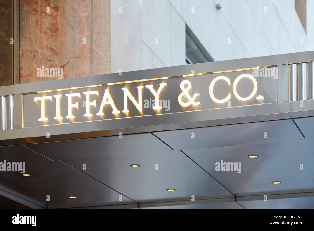 Tiffany e Co. shop sign Fifth Ave illuminated on September 12, 2016 in New York. Tiffany is an American internationally renowned jewelry retailer Stock Photo