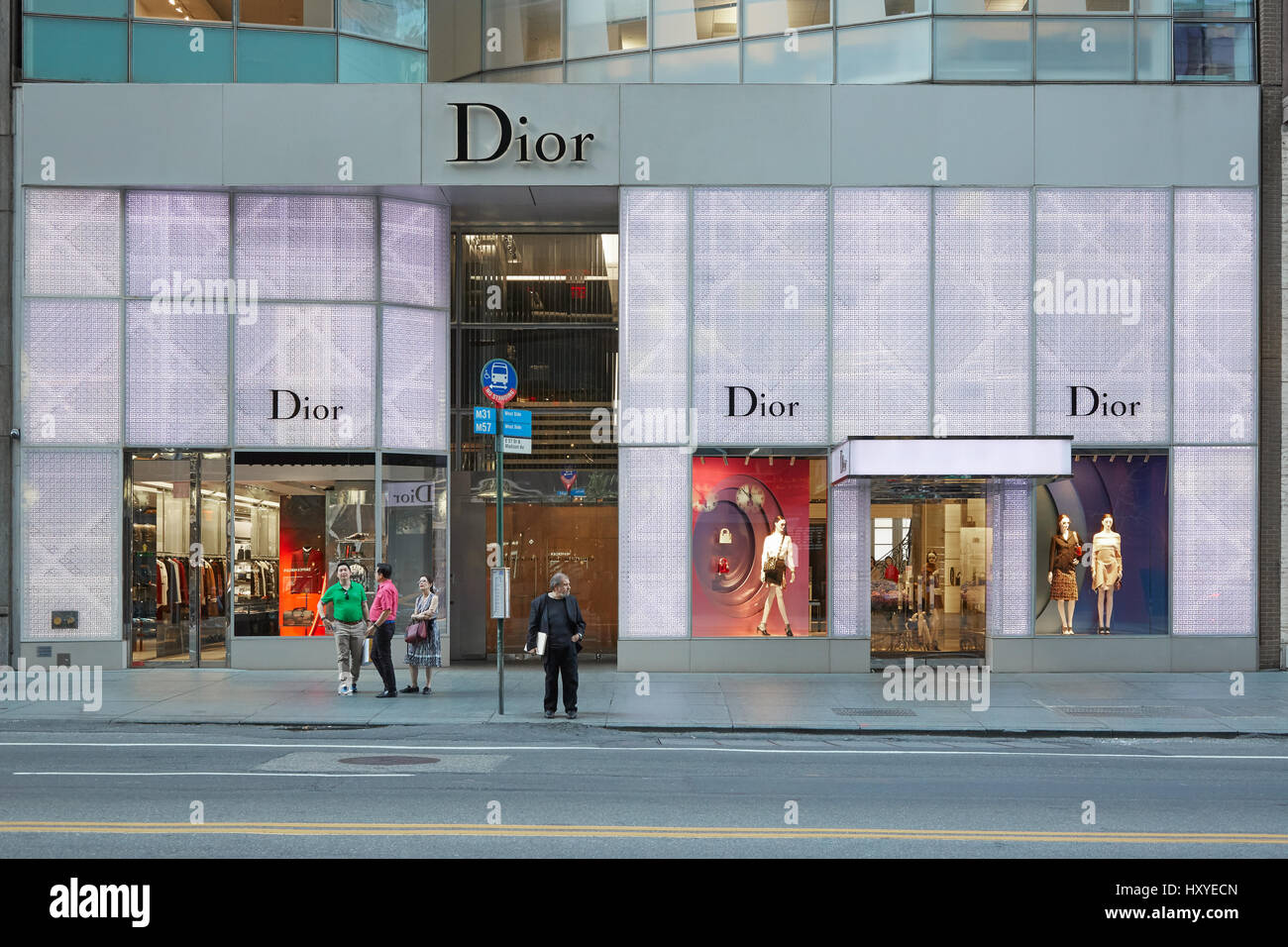 Christian Dior shop illuminated at dusk in 57 th Street on September 12, 2016 in New York. Dior is a fashion house founded in Stock Photo