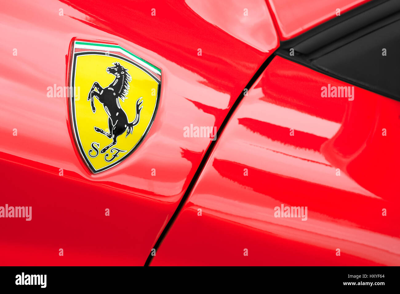 WINNERSH, UK - MAY 18: Ferrari sports-car badge closeup, part of a collection of classic and modern vehicles displayed for charity at Bearwood College Stock Photo