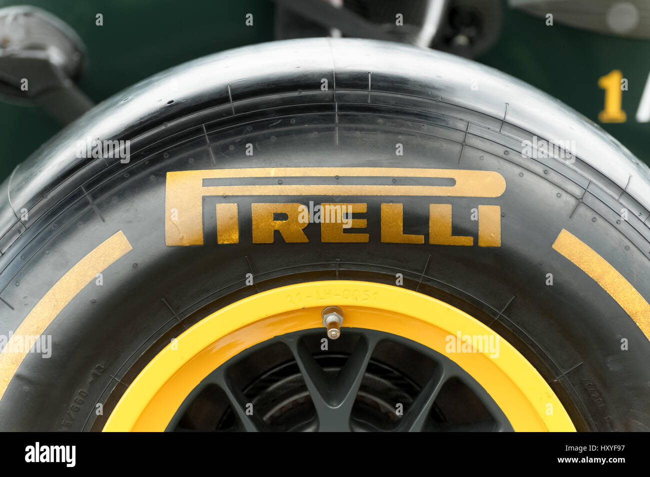 FARNBOROUGH, UK - JULY 15: Closeup of a Pirelli tyre attached to a Caterham Formula 1 race car on static display at the Farnborough Airshow, UK on Jul Stock Photo