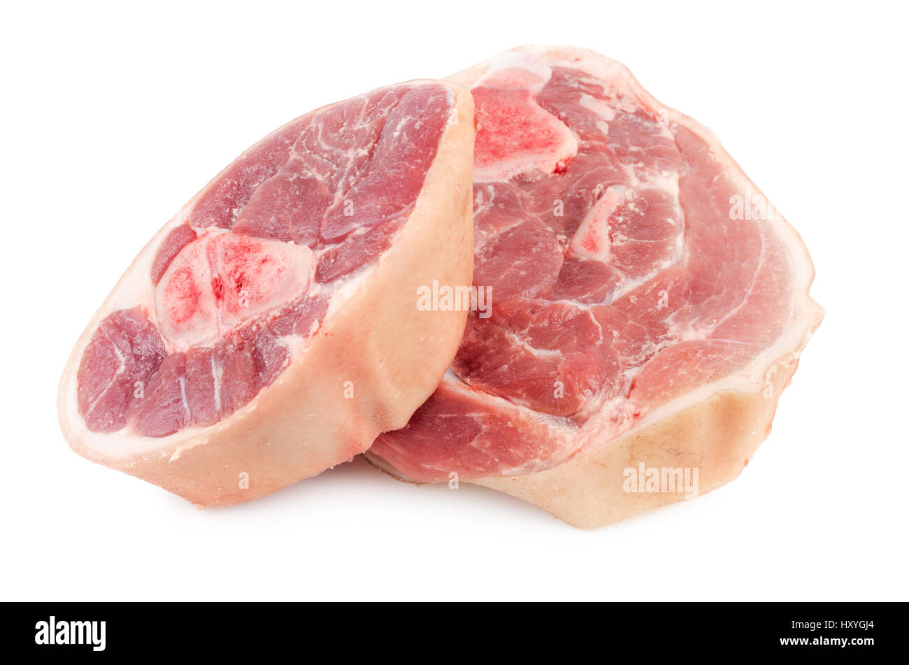 Slices of raw pork knuckle isolated on white background Stock Photo