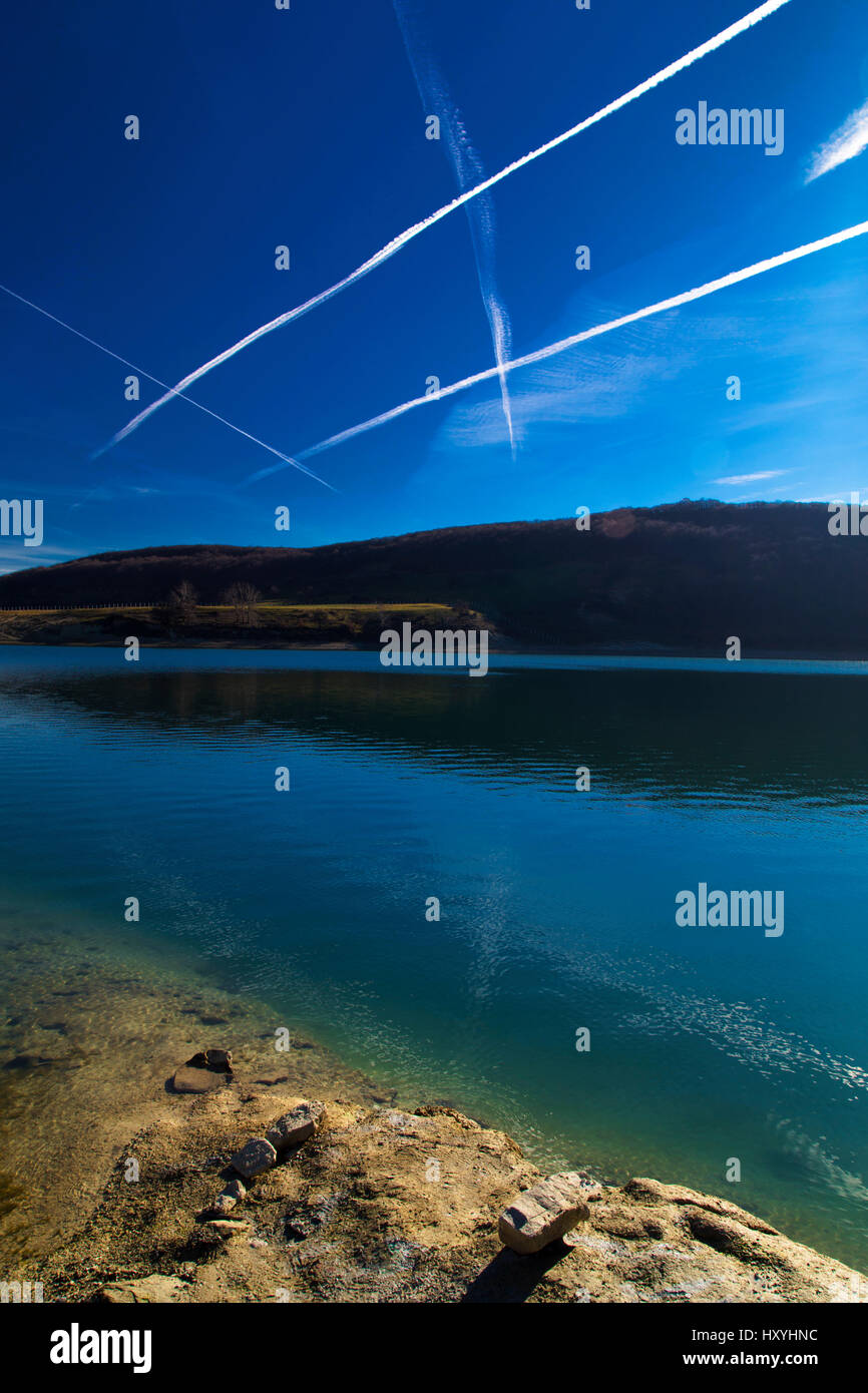 Beautiful landscape with pond and blue sky Stock Photo - Alamy