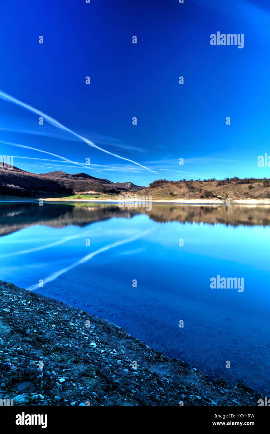 Beautiful landscape with pond and blue sky Stock Photo - Alamy