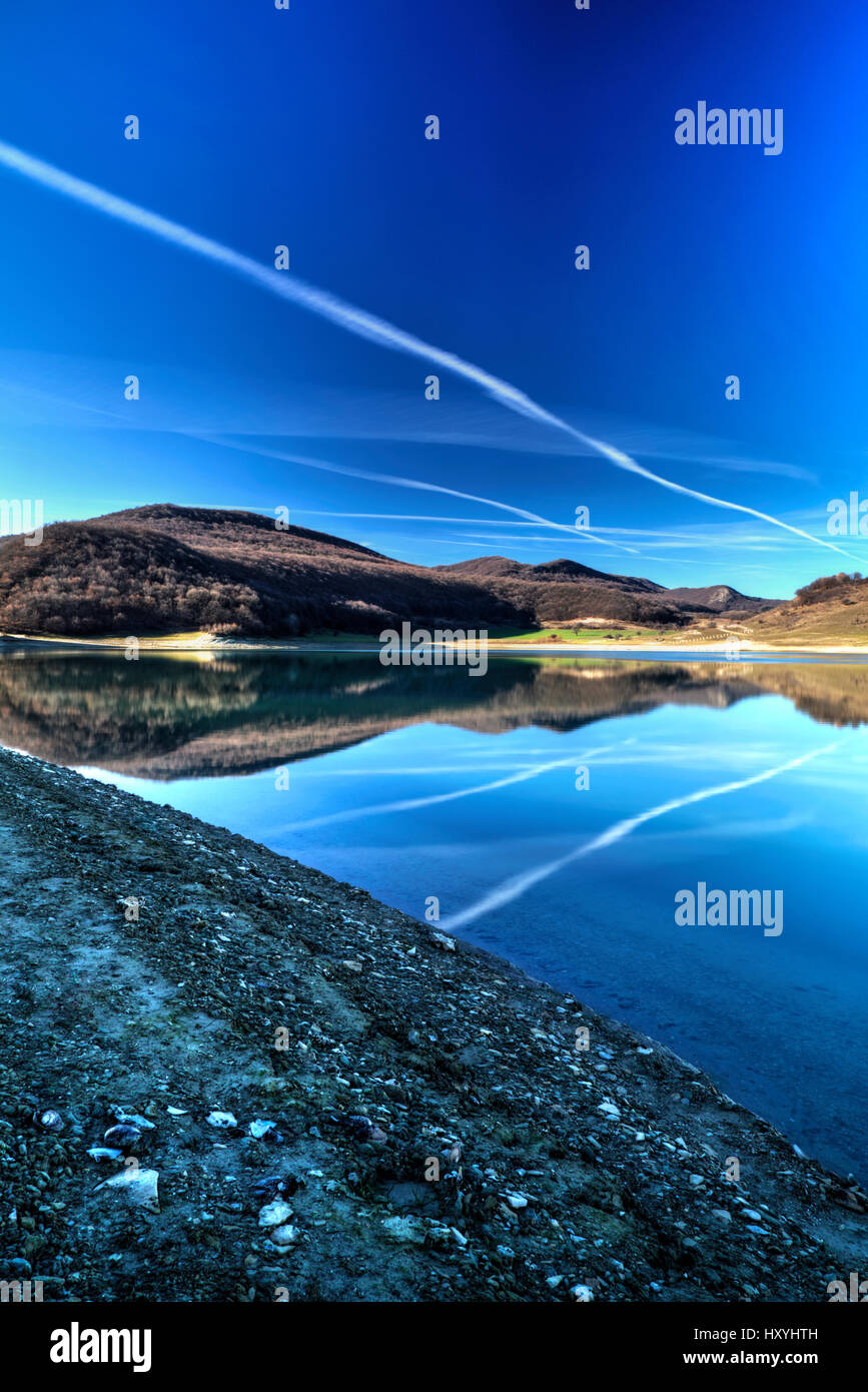 Beautiful landscape with pond and blue sky Stock Photo - Alamy