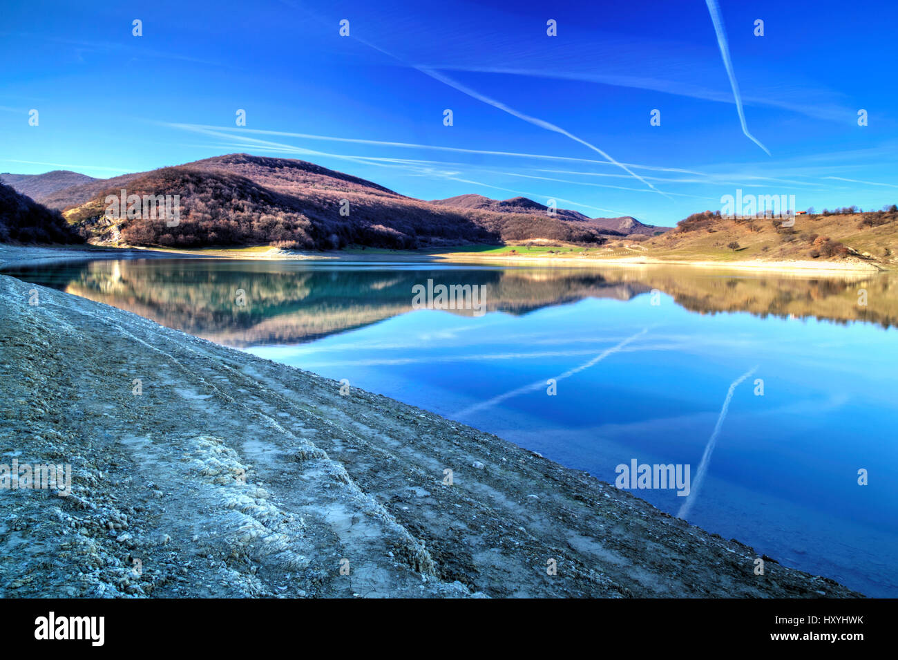 Beautiful landscape with pond and blue sky Stock Photo - Alamy