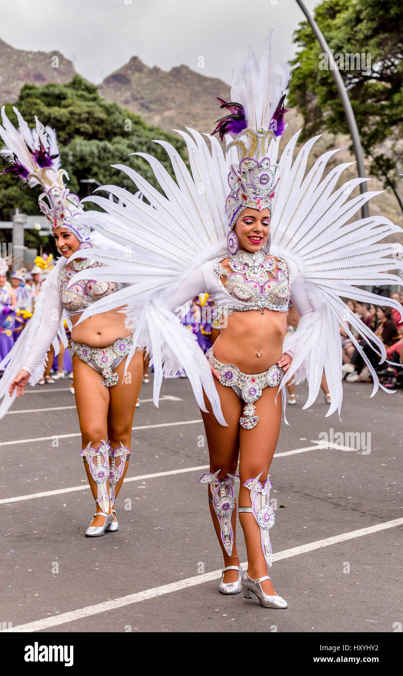 Women and Girls in elaborate costumes dancing in the Tenerife Carnival  parade Stock Photo - Alamy