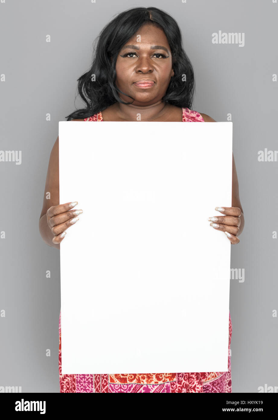 African Descent Woman Holding Blank Paper Stock Photo - Alamy