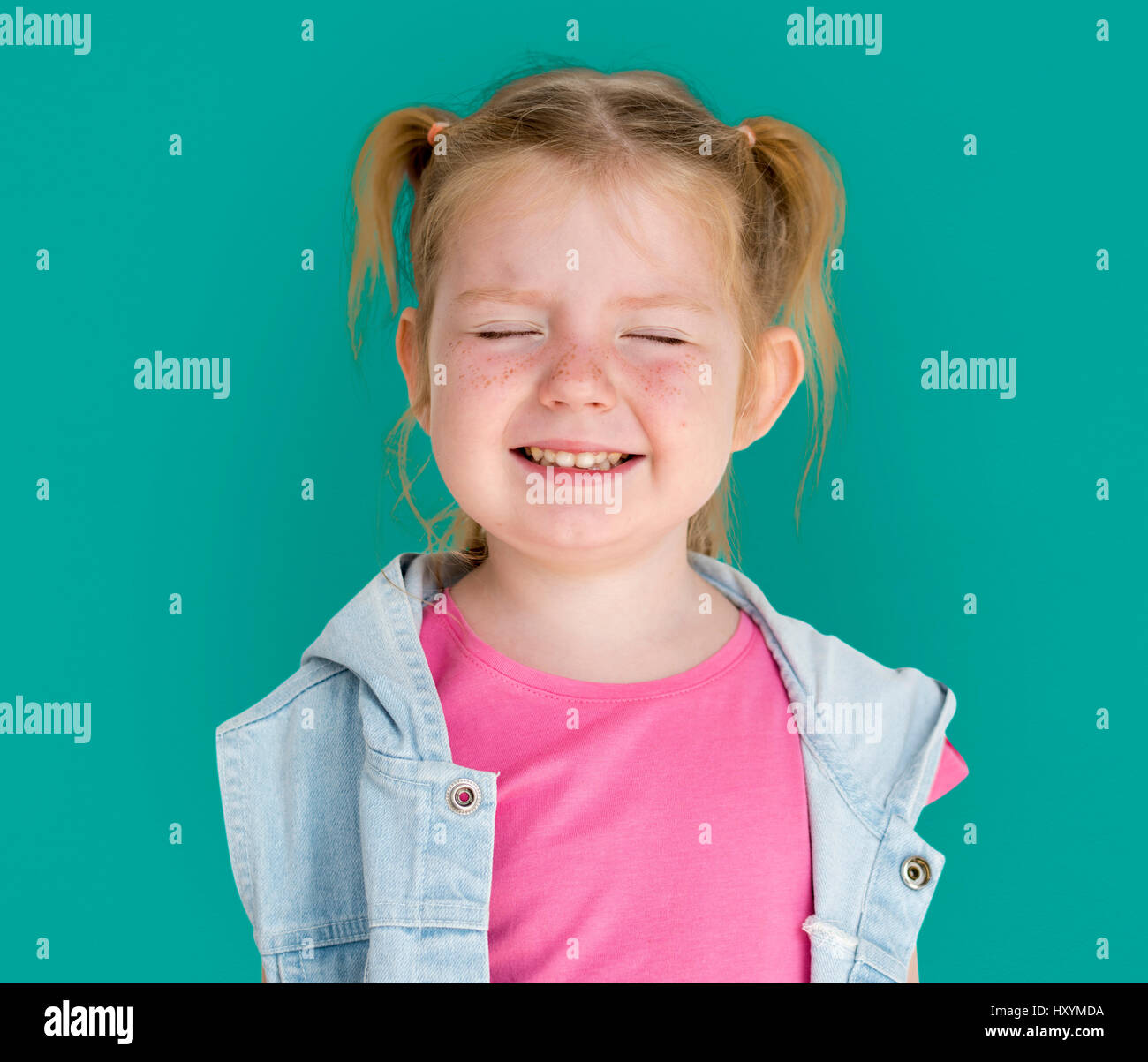 Little GIrl Smiling Happiness Playful Twintail Hairstyle Stock Photo