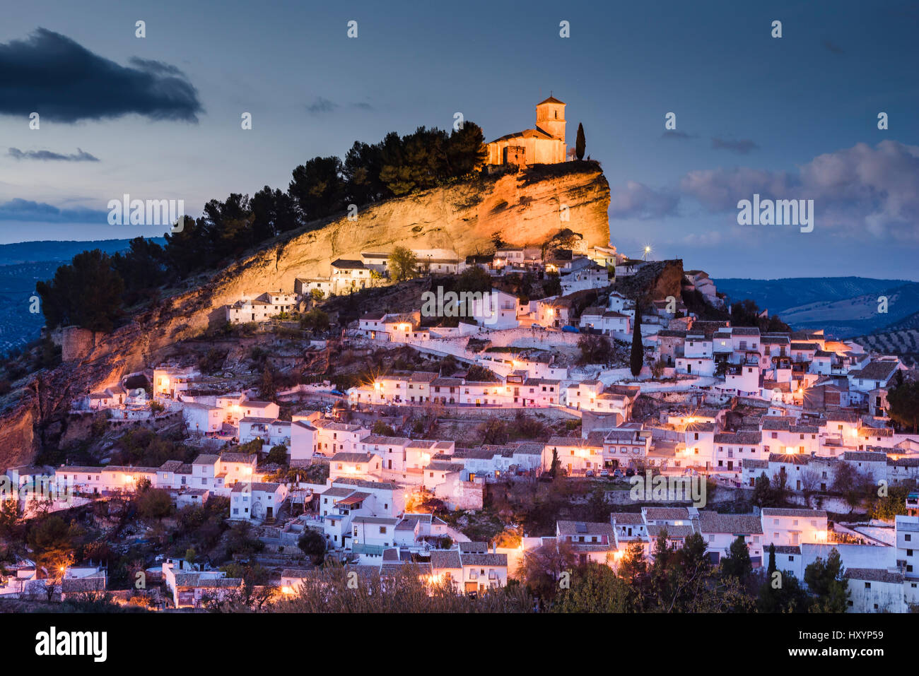 Cityscape with castle on hill in Montefrio at sunset. Montefrío, Granada, Andalusia, Spain, Europe Stock Photo