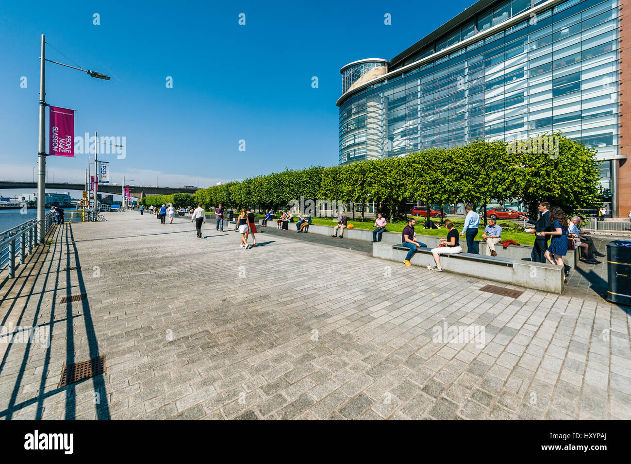 Lunch Hour on a Sunny Day in Glasgow in the Financial District by the River Clyde Stock Photo
