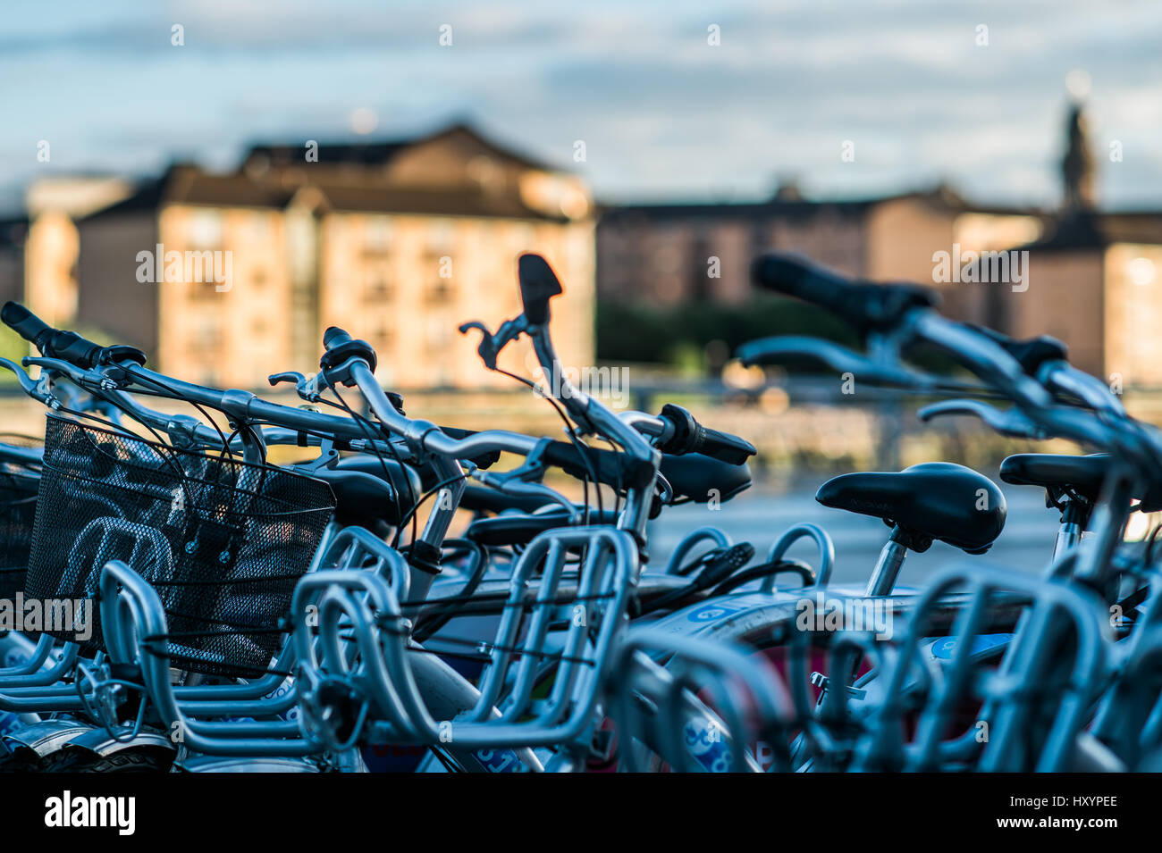 Bunch of Public Bicycles for Hire in Broomielaw, Glasgow Stock Photo