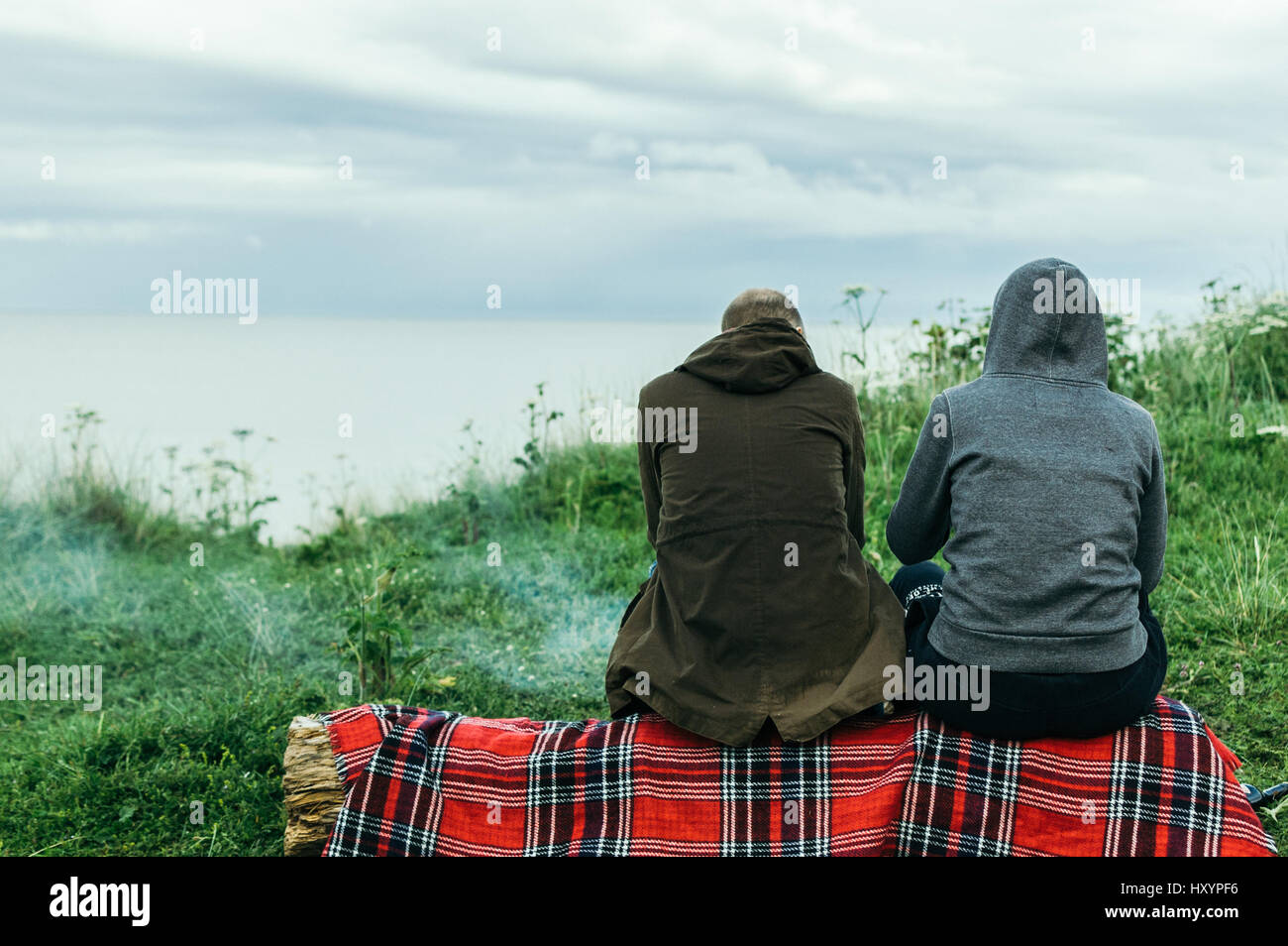 Couple Wild Camping In Lunan Bay On A Cloudy Day Stock Photo Alamy