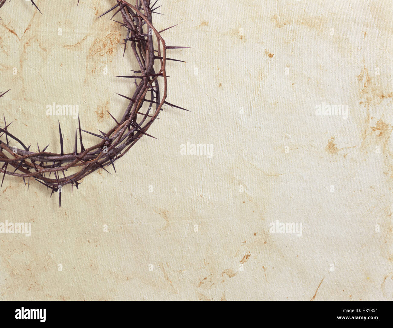 Crown of thorns on textured paper background Stock Photo - Alamy
