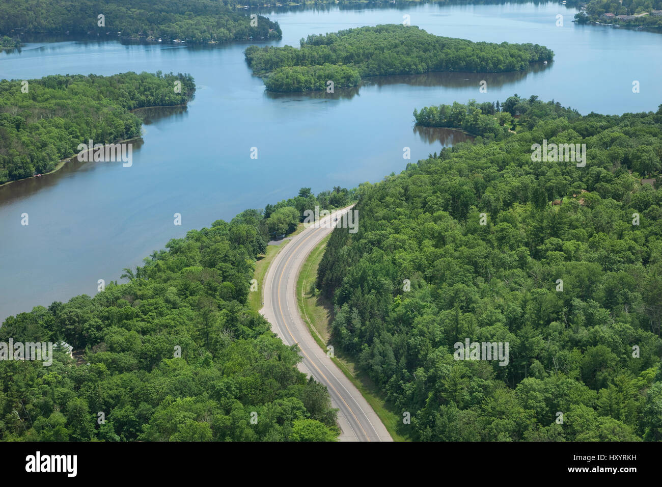 An aerial view of the Mississippi River and a curving road near Brainerd, Minnesota Stock Photo