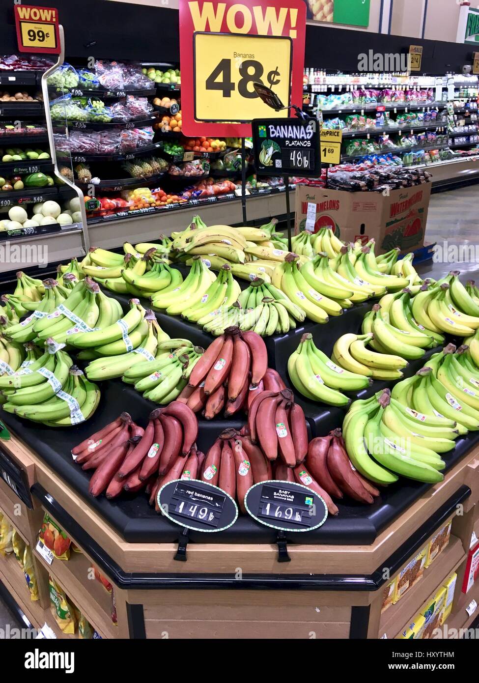 Assortment of bananas in produce section Stock Photo Alamy