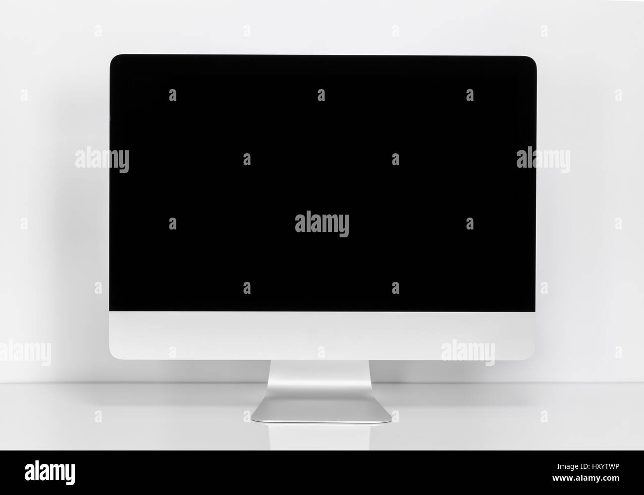 Computer display with blank black screen at the desk Stock Photo Alamy