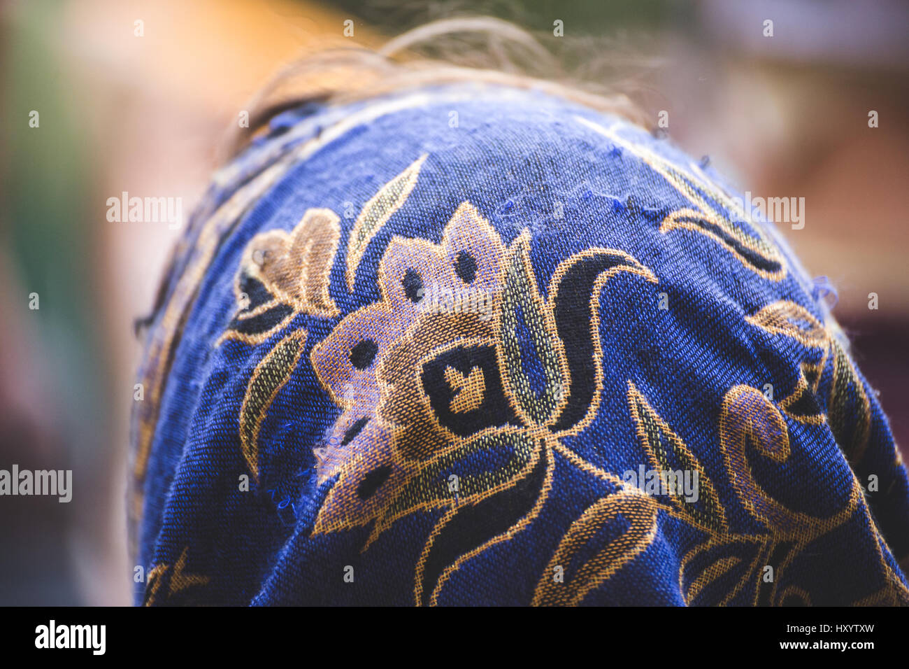 Close up of the back of a woman's head scarf Stock Photo