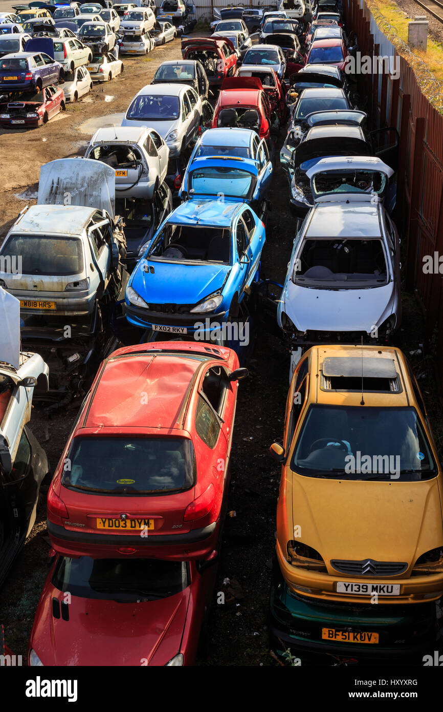 GRIMSBY, ENGLAND MARCH 14 Various colour cars stacked up in car