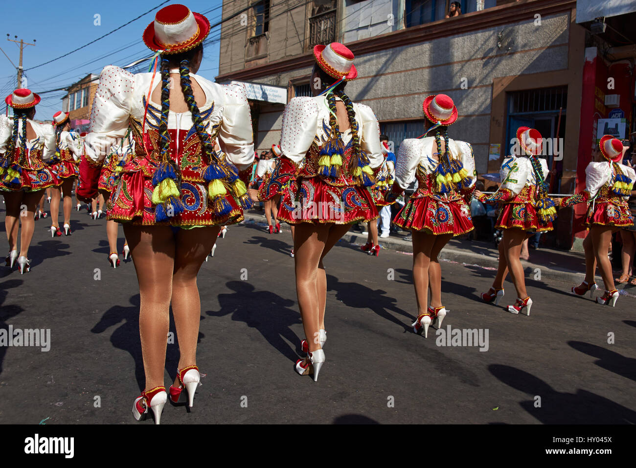 Caporales Dance Group In Ornate Red And White Costume Performing At The Annual Carnaval Andino