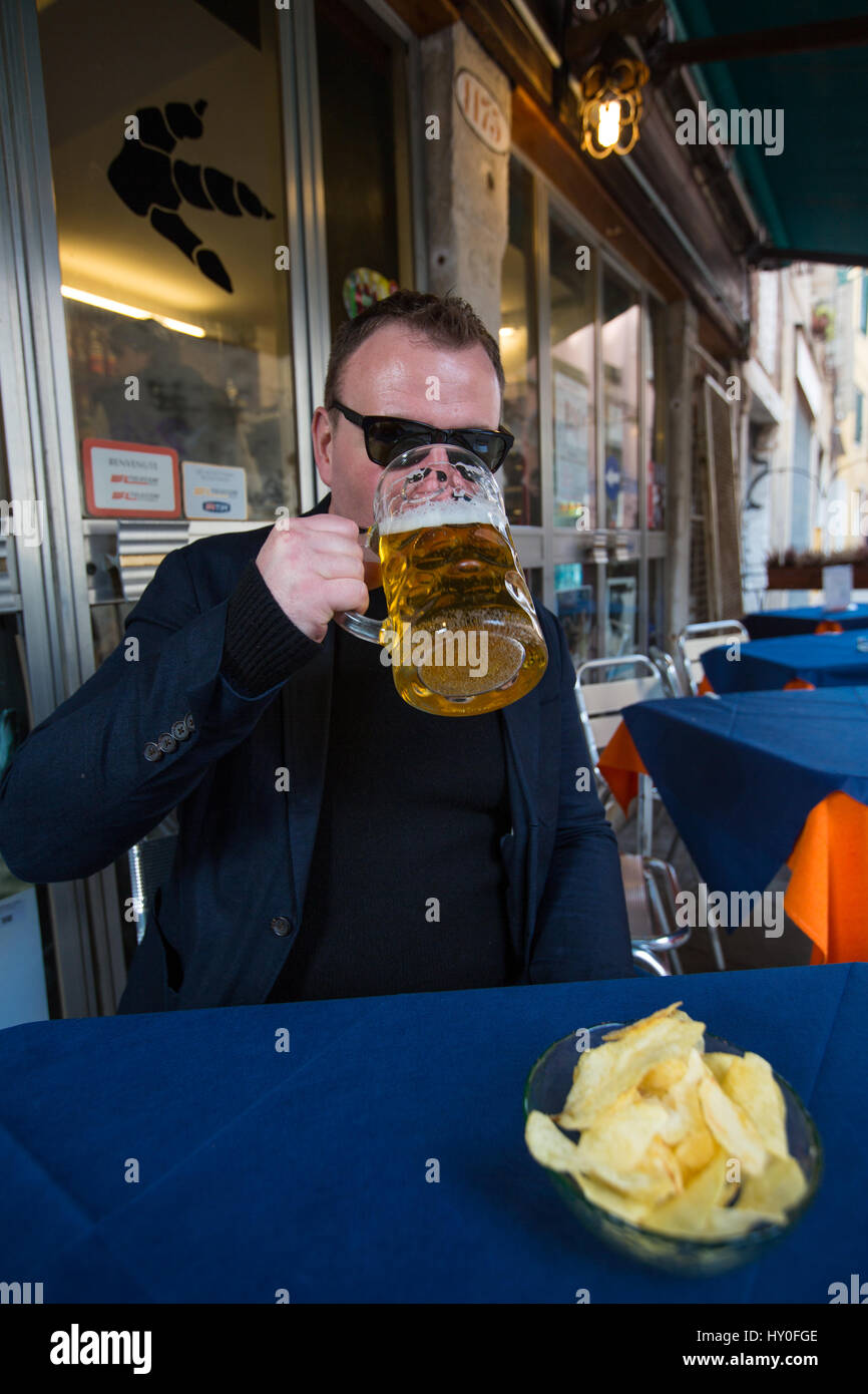 Man Drinking A Large Beer Stock Photo Alamy