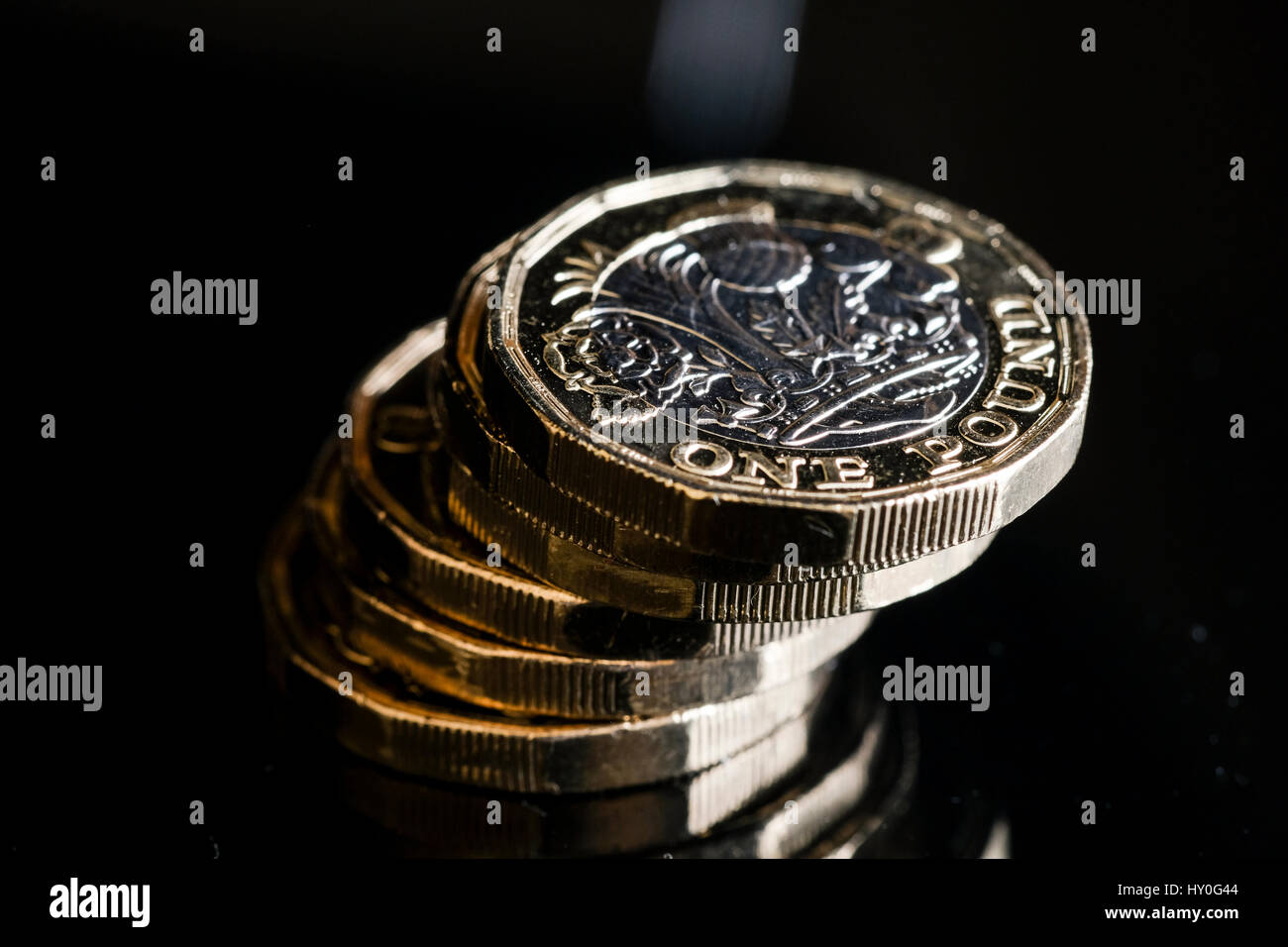 2017 new pound coins against black background Stock Photo