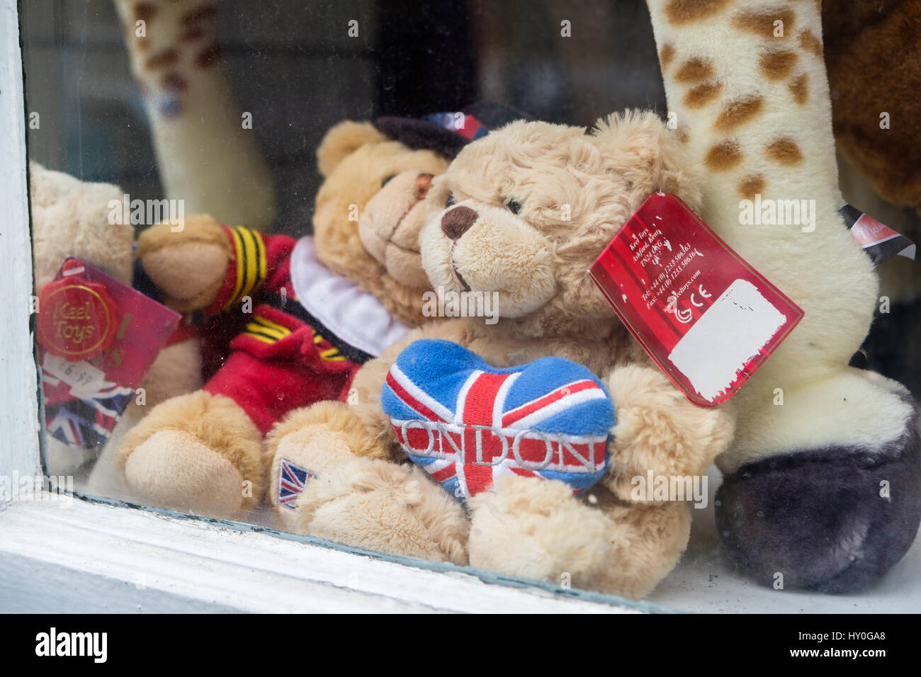WINDSOR, UK - MARCH 18, 2017: Teddy bears in a souvenir shop window in the popular tourist town on Windsor in March 2017. Stock Photo