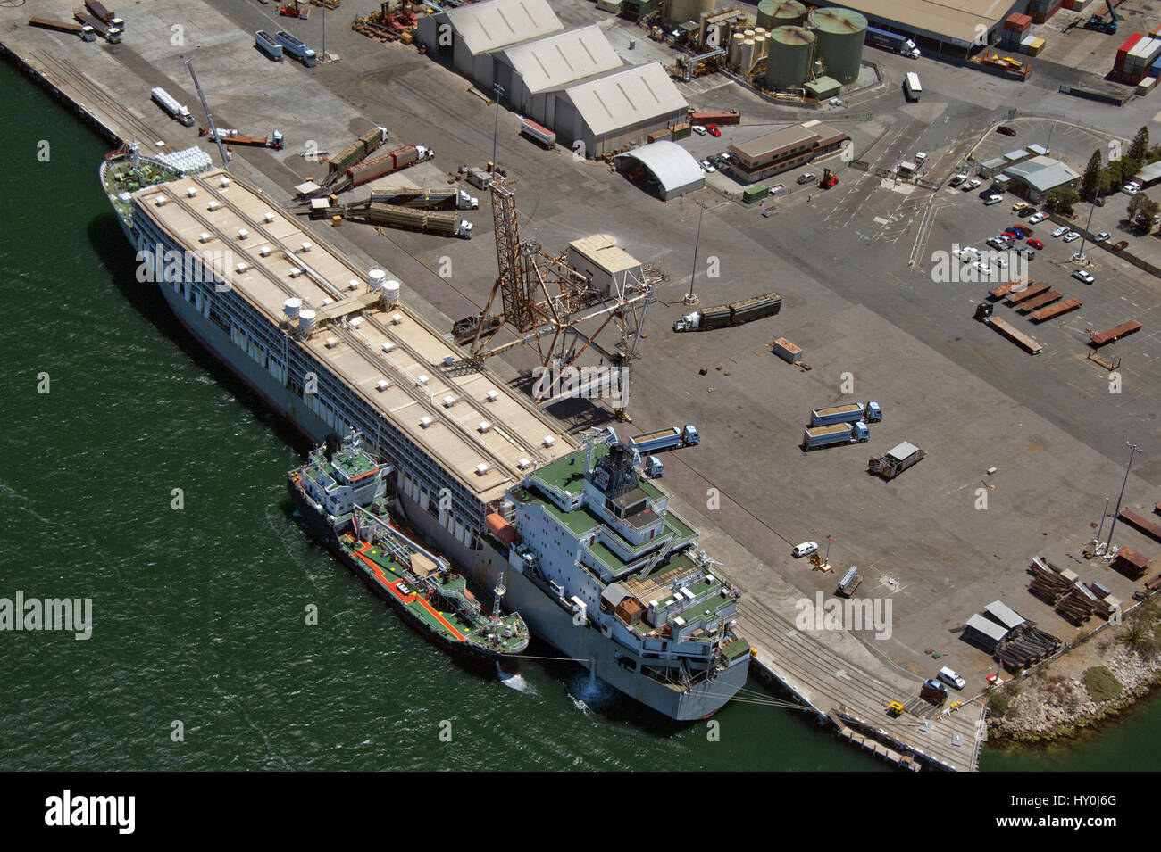 An aerial view of live-export, sheep ship being loaded at The Western Australian port of Fremantle. The Swan River empties into the sea at this port. Stock Photo