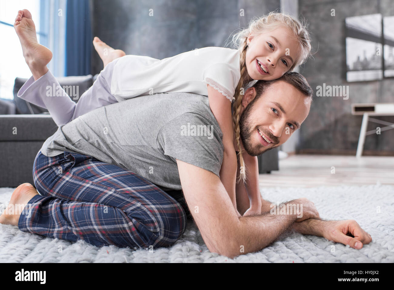 Happy father and daughter playing and having fun together at home Stock ...