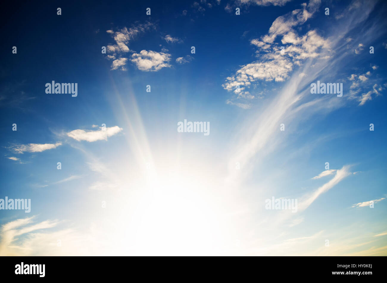 the bright rays of the rising sun in the morning sky Stock Photo Alamy