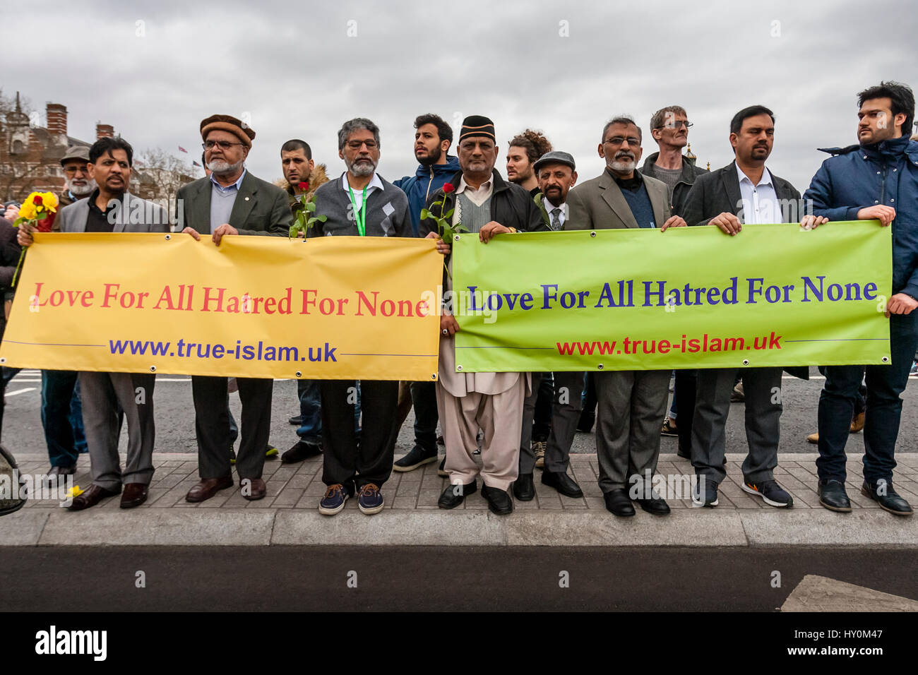 A Week On From The London Terror Attack, Members Of London's Muslim Community Hold Banners Denouncing The Attack, Westminster Bridge, London, UK Stock Photo
