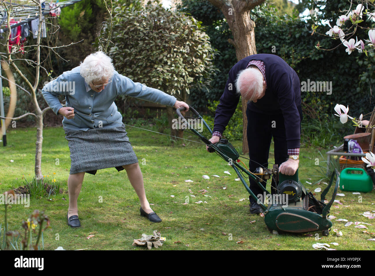 Old lady outside gardening hi res stock photography and images