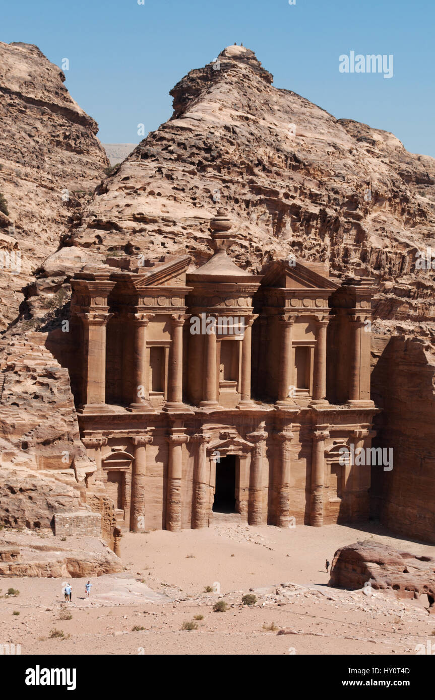 Jordan: the Jordanian landscape with view of the Monastery, the monumental building carved out of rock in the archaeological Nabataean city of Petra Stock Photo