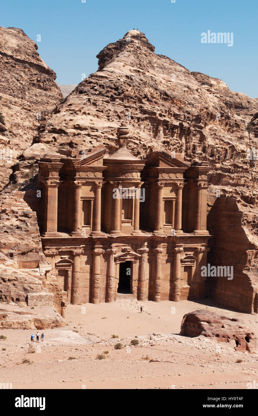 Jordan: the Jordanian landscape with view of the Monastery, the monumental building carved out of rock in the archaeological Nabataean city of Petra Stock Photo