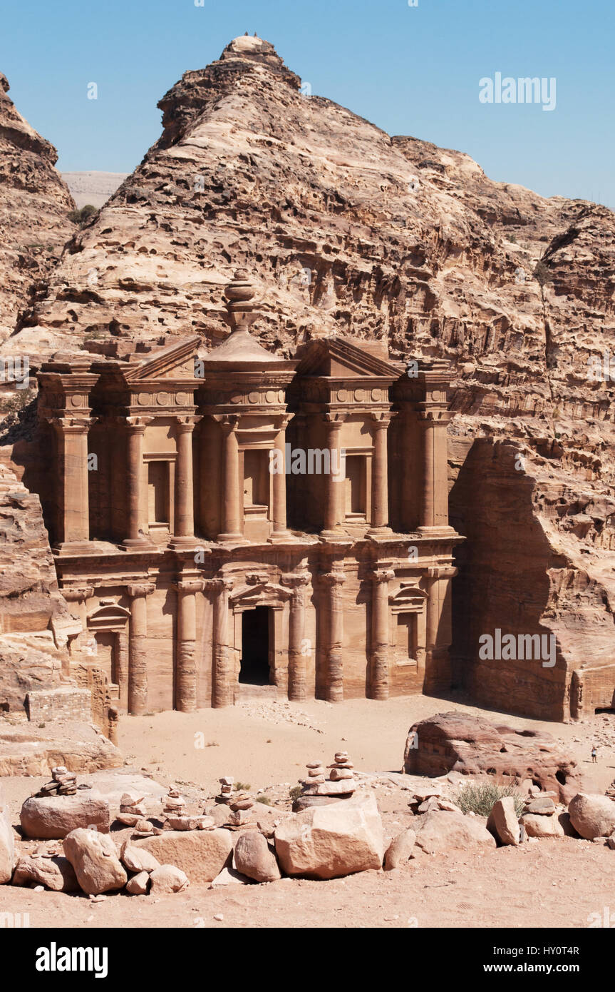 Jordan: the Jordanian landscape with view of the Monastery, the monumental building carved out of rock in the archaeological Nabataean city of Petra Stock Photo