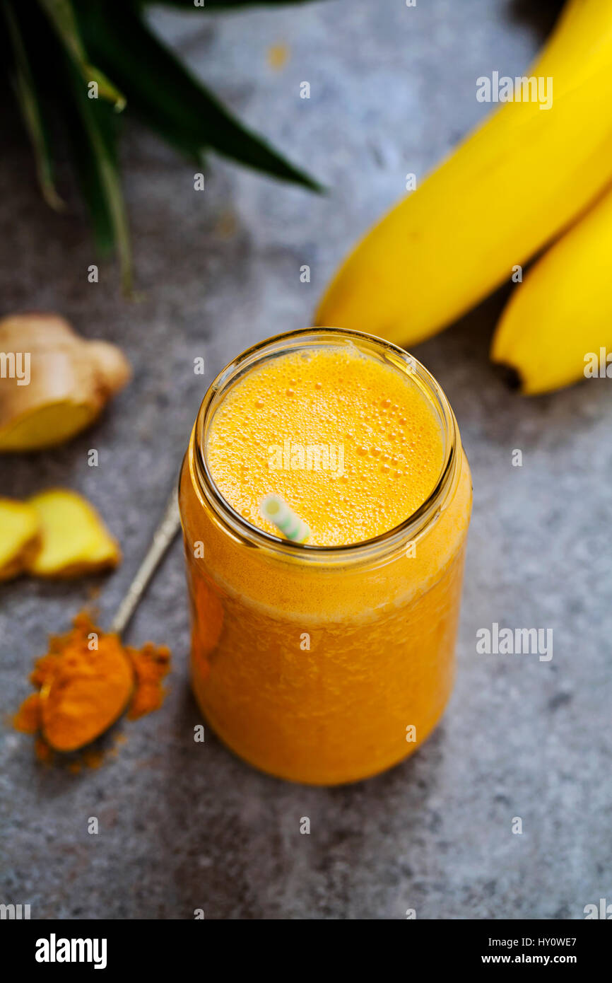 Smoothie with turmeric, banana, ginger and pineapple Stock Photo Alamy