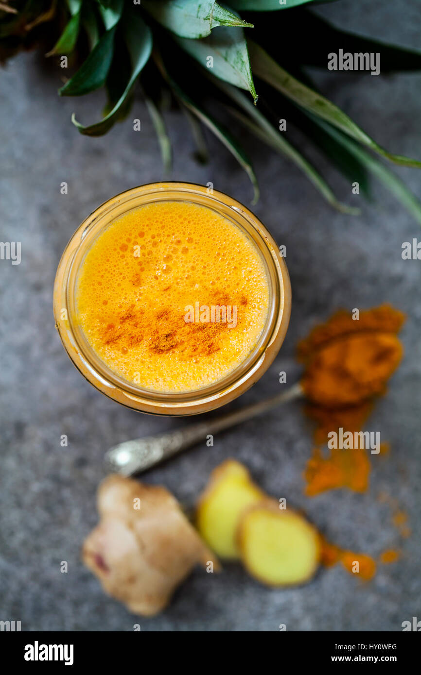Smoothie with turmeric, banana, ginger and pineapple Stock Photo Alamy