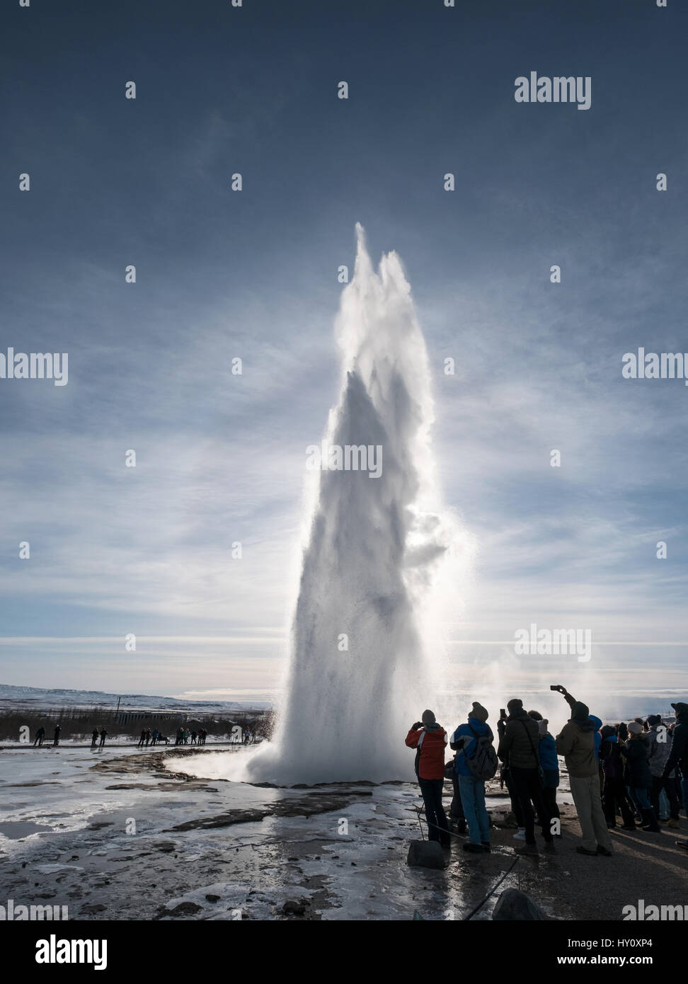 STROKKUR, ICELAND - 1 MAR - Groups of tourist watching natural fountain geyser in holidays at Strkkur, Iceland on 1 March, 2017 Stock Photo