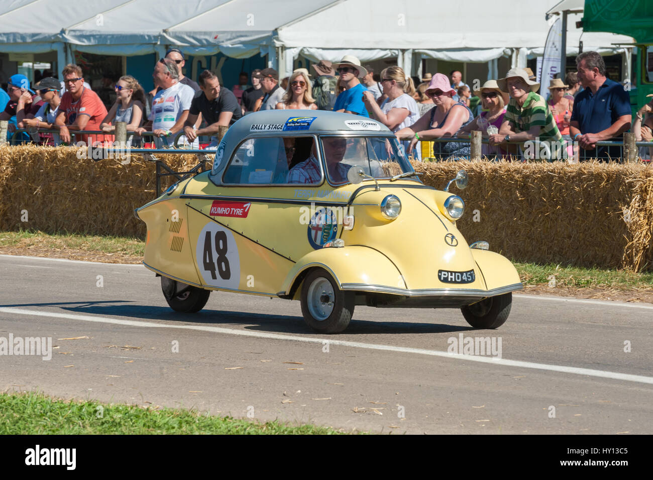 Laverstoke, Hampshire, UK - August 25, 2016: Terry Maynard driving a vintage Messerschmitt KR20 bubble-car at the CarFest motoring event in Laverstoke Stock Photo