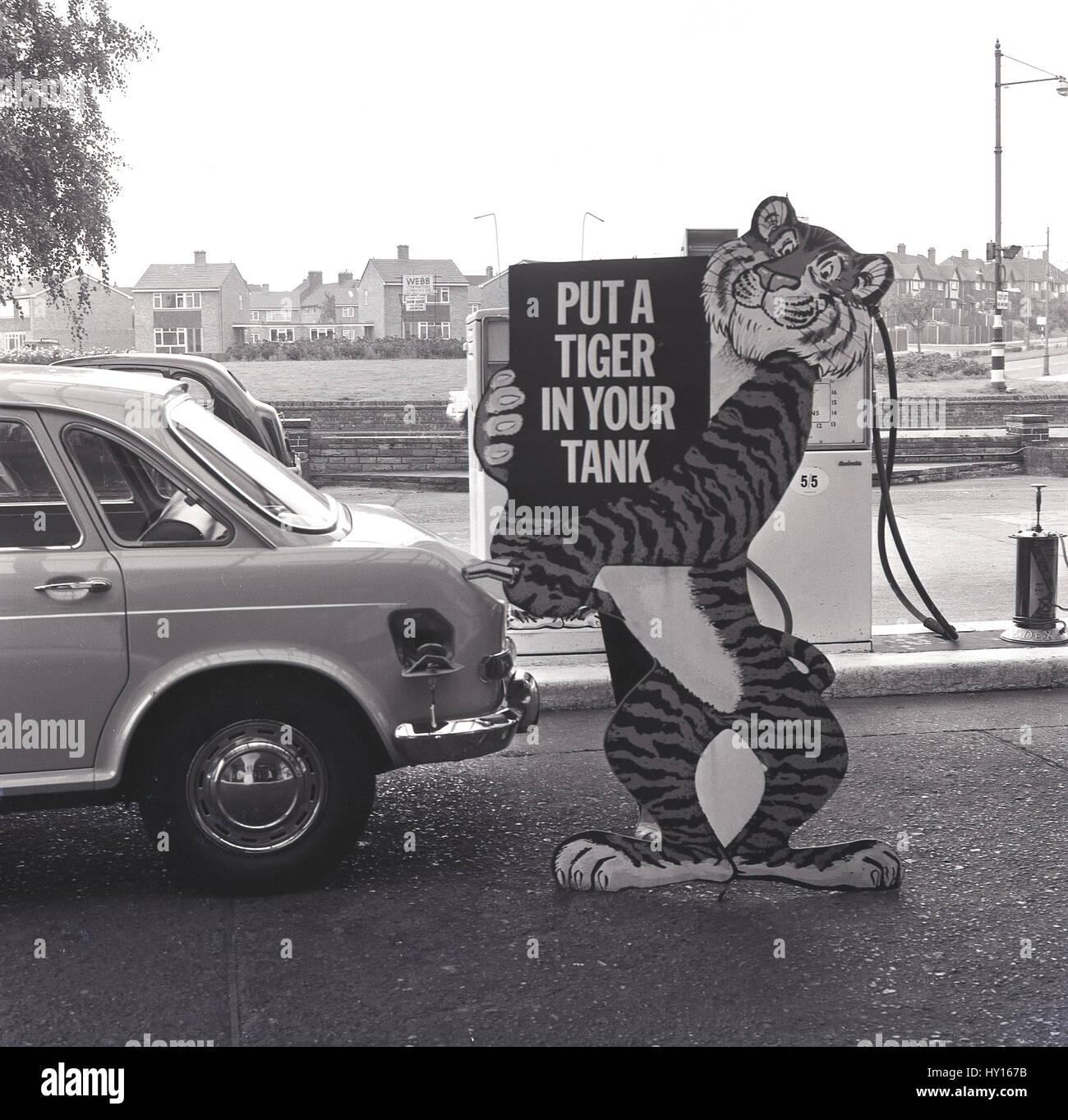 1960s, historical, garage forecourt sales display for Esso fuel, 'Put A Tiger In Your Tank', England. Designed to promote Esso as being powerful fuel, a beast  in your engine. Stock Photo