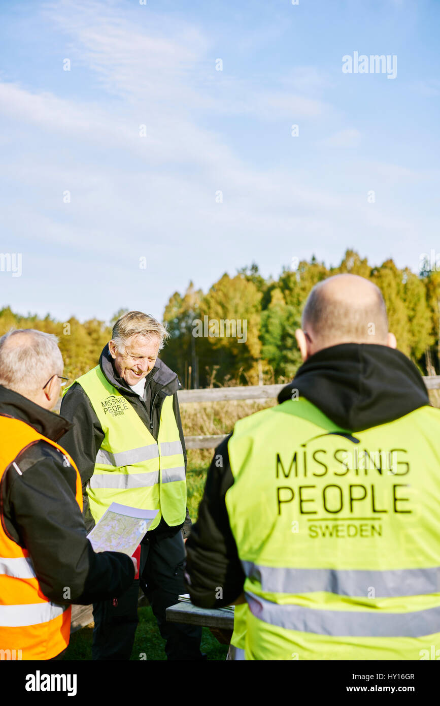 Sweden, Uppland, Rison, Volunteers helping emergency services find missing people Stock Photo